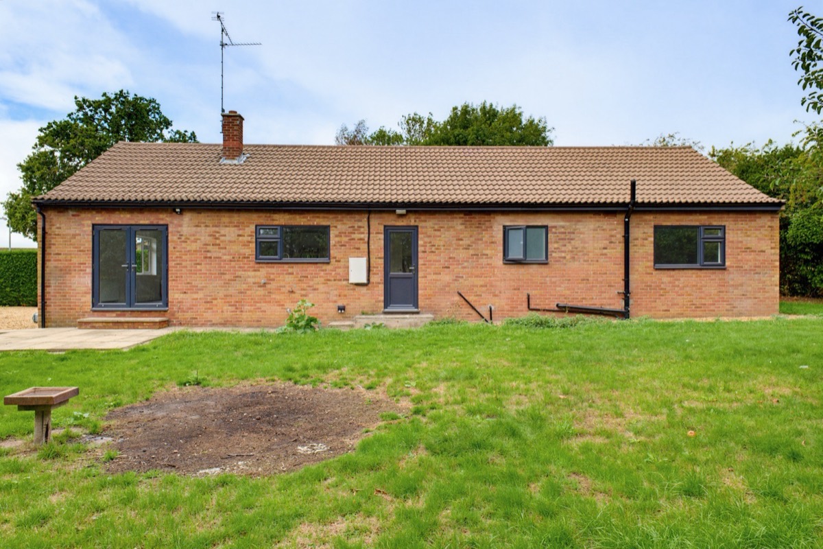 Red brick bungalow rear elevation, wide view